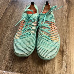 Aqua blue Nike sneakers